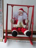 Tobia's Babbo Natale dondolante sull'altalena  funzionante a pila 